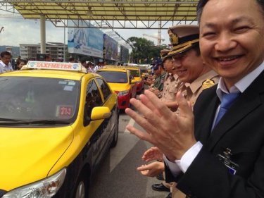 The Phuket airport director hails the arrival of meter taxis today