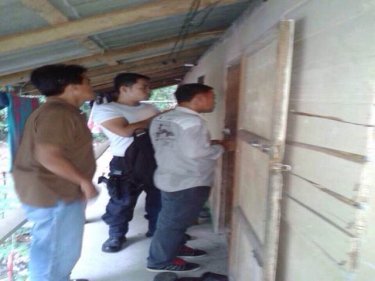 Police move door-to-door on Kho Tao in the hunt for a killer or killers