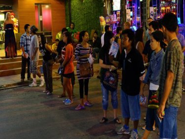 The wall of ping-pong show touts greeting Patong tourists last night