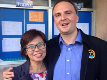 Case dismissed: Andy Hall with a supporter at the Bangkok court today