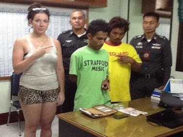 Briton Katherine Salmon and a lifeguard finger a Phuket thief yesterday