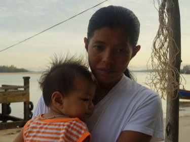 Yupin Chotprapast with her son Jedi in Nam Khem, north of Phuket