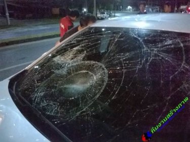 The smashed windscreen, cracked by the impact of the woman early today