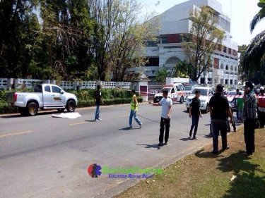 The body of the boy outside Phuket Vocational College this afternoon