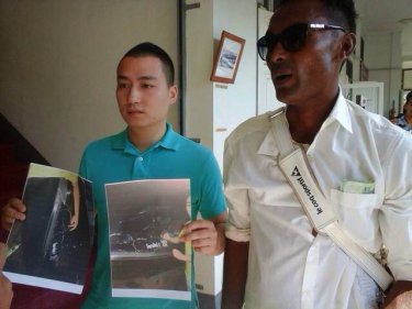 Chinese tourist Zhang Cheng, 27, with photos of a crashed jet-ski