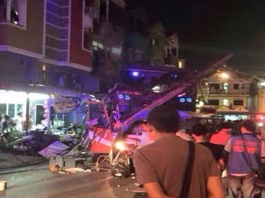 The bus comes to a rest after crashing out of control down Patong Hill tonight