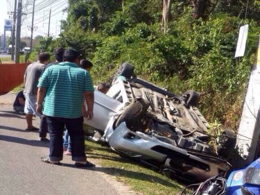 The flipped limousine on the Phuket airport road today