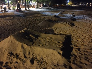 The coincidental carving of Patong sand castles that look just like sunbeds