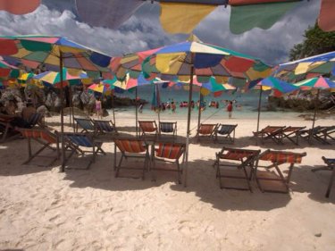 Kai island, where day-trippers crowd the space under umbrellas all year