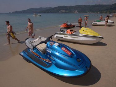 Jet-skis at Patong beach are now off the sand but in larger numbers