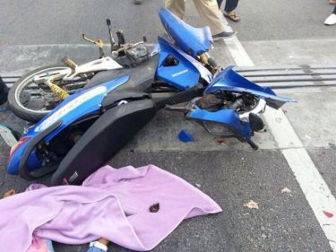 The boys' motorcycle after the fatal crash on Srisoonthorn Bridge