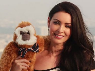Natalie Glebova with her new, cuddly friend in the Facebook video