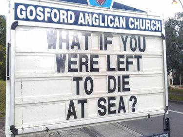 A sign outside an Australian church speaks for humanitarians everywhere