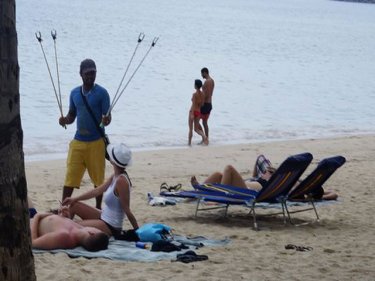 Selfie sticks are popular with vendors who no longer exist at Phuket's beaches