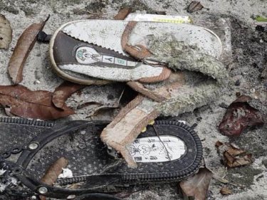 Baby's shoe found at a trafficker's camp north of Phuket, where murders, rapes and torture were also alleged to have taken place
