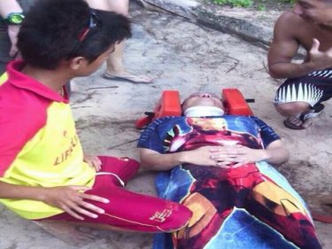 The injured Chinese tourist being cared for by Phuket paramedics yesterday