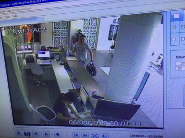 Gotcha - a Phuket hotel camera shows the ''stolen'' items in a bag