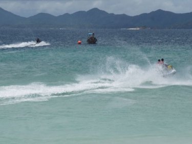 Beauty, nature . . . and jet-skis. The mix that Phuket prefers