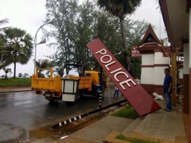 A storm tekes its toll on Phuket's Karon Police Station late yesterday