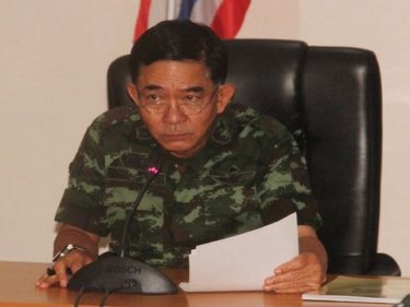 Lt General Prakarn Cholayut listens to ''official'' problems yesterday