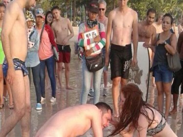 Frantic efforts to save the man's life are made by other tourists at Patong