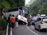 Phuket Taxi Cuts Off Tour Bus on Patong Hill: Backwards Crash Puts Four Indians in Hospital