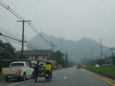 Haze covers the karsts of Phang Nga in late afternoon yesterday