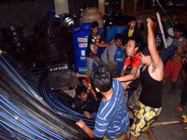 Fourteen police suffered injuries in a beating from Phuket rioters