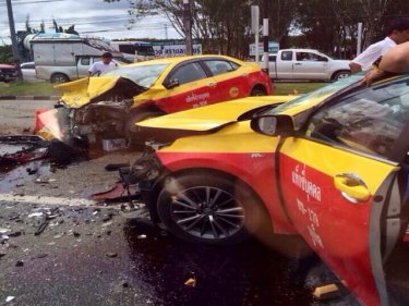 Taxis in the three-car pileup today near a Phuket main road t-junction