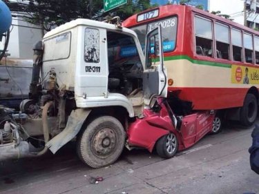 The driver of the car  survived this Bangkok sandwich today
