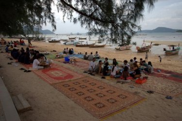 Rival restaurants offer traditional Thai picnics on the beach at Rawai. 