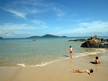 Thai children at play on an island with many blessings.