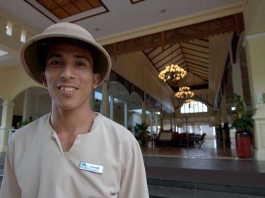 Smiling through: Doorman at the new Sofitel in Krabi