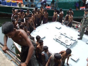 Marine Police make an earlier arrest of boat people along the Andaman