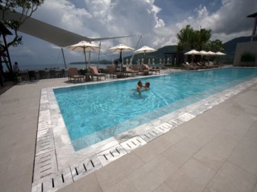 The pool at Cape Sienna drinks in sky and sea views