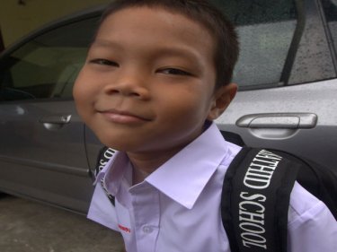 A boy, a car, a fresh start at school: one of 30,000 crowding Phuket