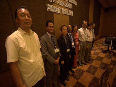 Negotiating team leaders after their historic trade agreement on Phuket