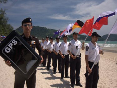 International flags fly at Patong for a mock rescue, comforting for some