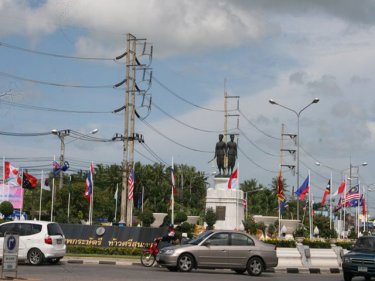 The Heroines Monument surrounded by national flags for the Asean Regional Forum