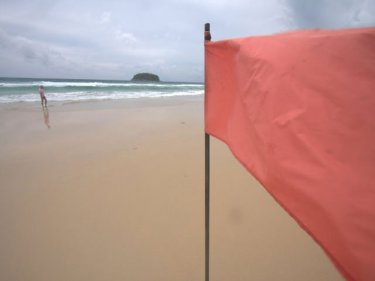 A red flag on a Phuket beach: Now Phuket is being red-flagged
