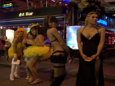 Ladyboys in Patong during a US warship visit in June: There is no suggestion that the katoeys in the photograph are party to the crimewave