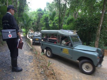 Siam Safari vehicles on an elephant trek on Phuket's Nakkerd Hill