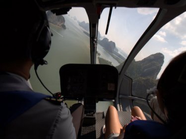 Sweeping vistas across Phang Nga Bay are the pinnacle of a Phuket flight