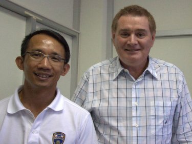 Police Colonel Panuwat Ruamrak with Larry Cunningham