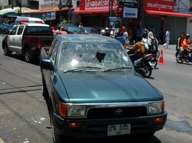 The shattered windscreen of the family's vehicle in Phuket City today