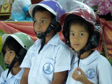 Phuket's headstart for happiness puts helmets into school shelves