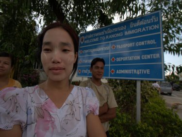 Burmese workers wait for friends outside Ranong Immigration in 2008