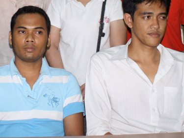 Accused Phuket EMS thieves Payuk Narkkee (left) and Rachata Painjid