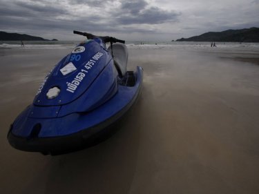 A jet-ski on Phuket's Patong beach: from villains to heroes