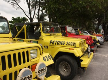 Present-day parking along Patong's beach road: change is coming